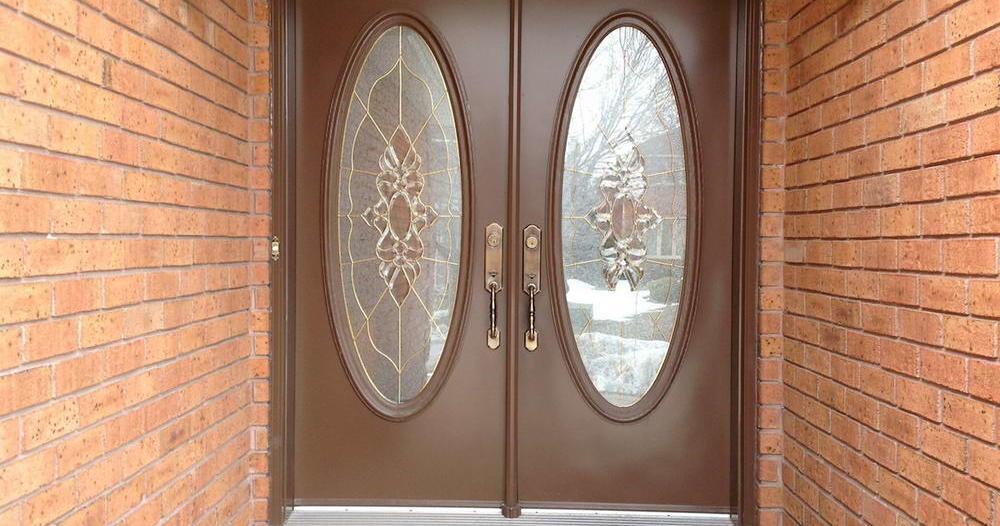 double door with rounded glass