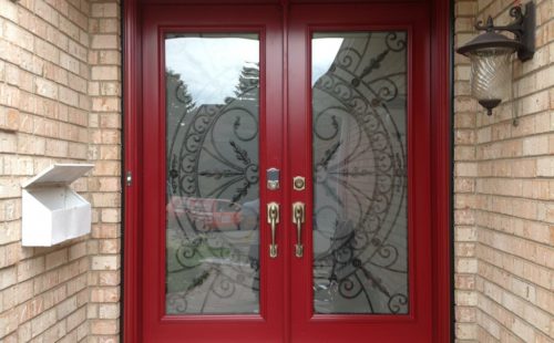 Bright red double front door Canada