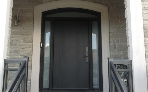 wooden door with two glass side panels