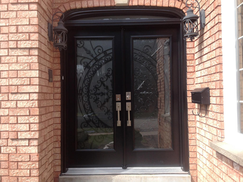 Double-door-with-two-glass-panels-and-iron-decoration-ornaments-1024x765-1