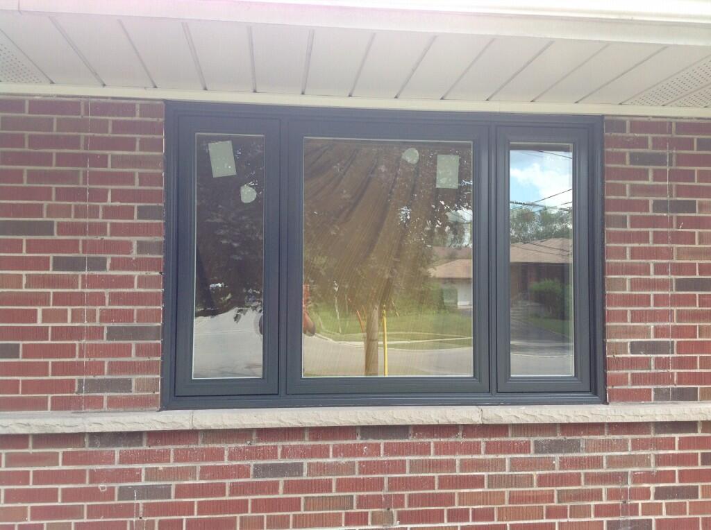 Triple-window-withe-black-frame-and-reflective-glass-aurora-1024x764-1